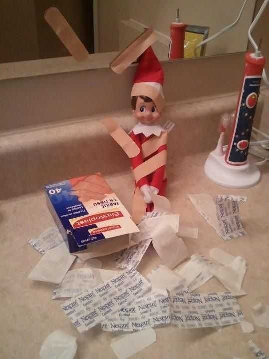 Elf On A Shelf Playing With Bandaids