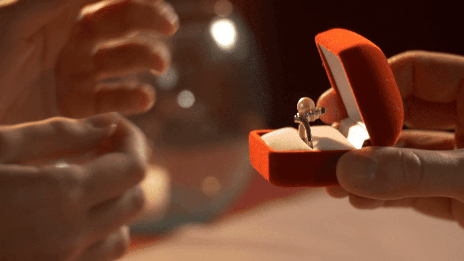 Marriage Proposal A Man Gives A Ring To A Woman Proposing Marriage She Surprises And Becomes Happy Detail Shot Indoors Restaurant Romantic Dinner