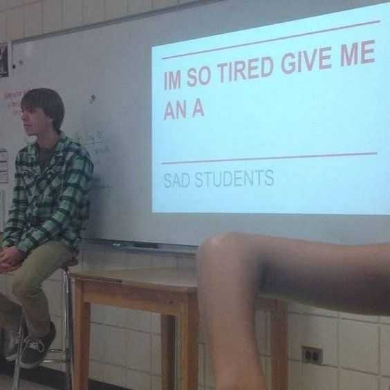 Student Meme Of A Student Sitting In Front Of A Projector Captioned I'm So Tired Give Me An A