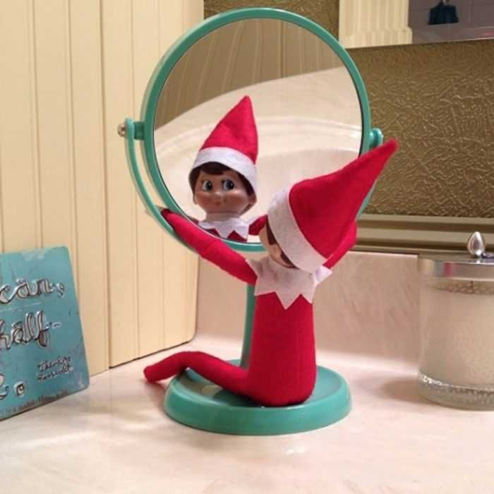 Funny-Elf-Elf Clever Elf On The Shelf Ideas Staring In The Mirror