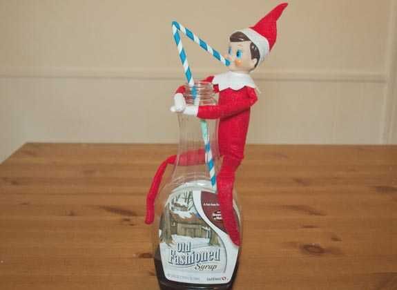 Funny-Elf-Syrup Clever Elf On The Shelf Ideas Drinking Maple Syrup With A Straw