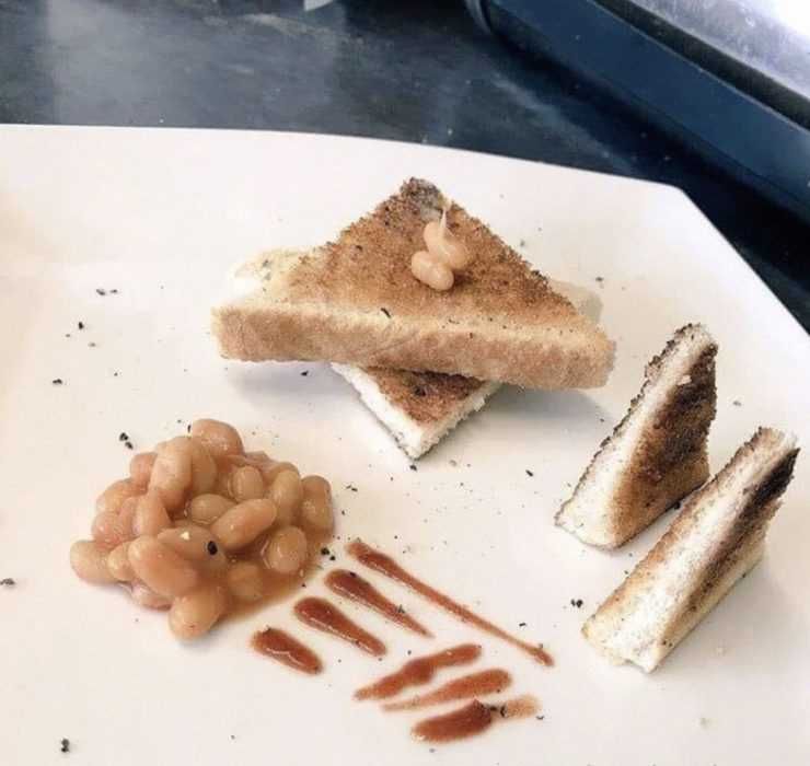 Cooking-After-Masterchef Meme Featuring A Plate Of Toast And Baked Beans Arranged Artistically After Watching Masterchef