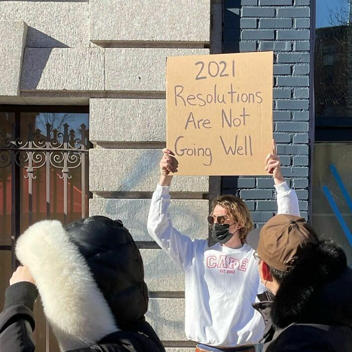 30 Hilarious Pictures Of A Man Protesting Obscure Things