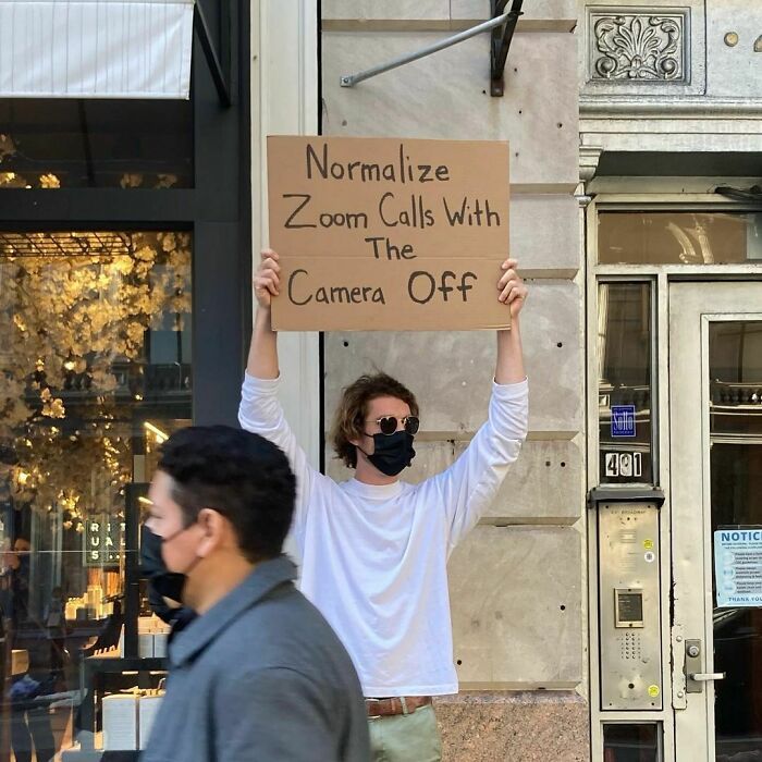 30 Hilarious Pictures Of A Man Protesting Obscure Things