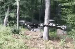 Flying Drone Shooting A Pistol Video Featured
