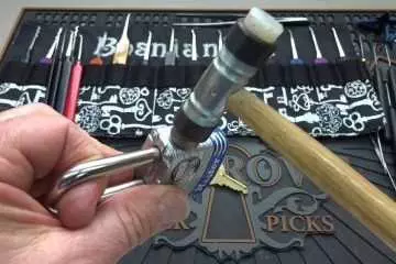 How To Open A Master Lock In Seconds  With Just A Small Hammer Featured