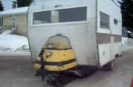 Crazy Snowmobile Powered Ice Fishing Camper Thing Video Featured