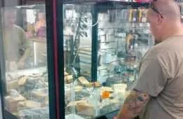 Gun Store Installs Claw Machine Full Of Ar Parts And Ammo Featured