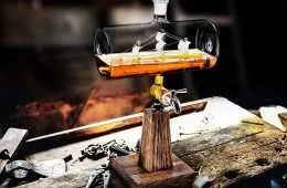 Ship In A Bottle Whiskey Decanter And Dispenser Featured