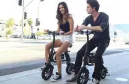 Two Models Posing On The Swagcycle