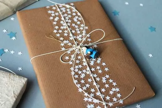 Diy Gift Wrapping  Star Hole Punch To Dress Up Some Boring Brown Wrapping Paper