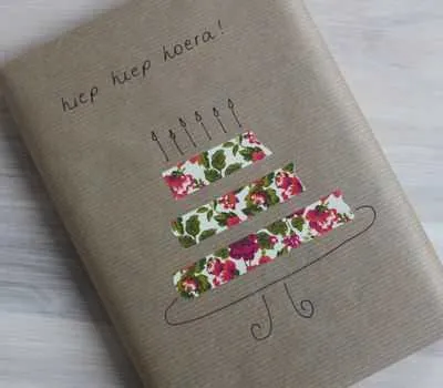 Diy Gift Wrapping  Strips Of Old Wrapping Paper Does The Trick