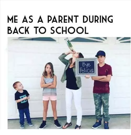 First Day Of School Meme Showing A Mom Drinking Wine From A Bottle Holding Up A Good Bye Sign