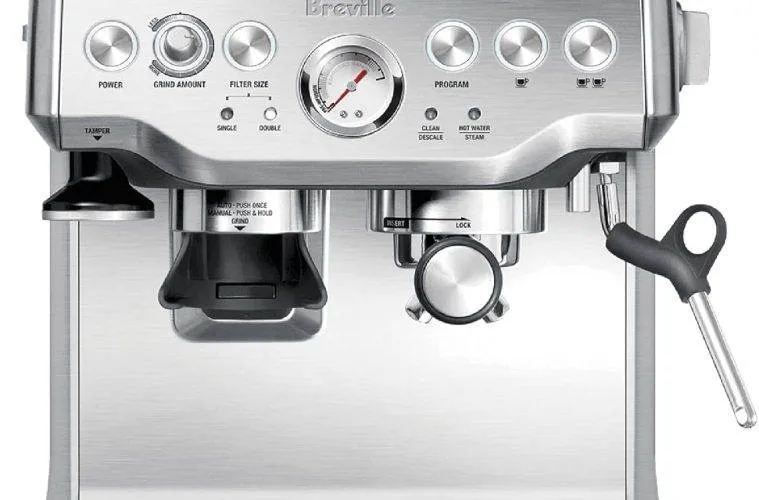 Design The Breville Barista Express Is A Stunning Addition To Any Kitchen. Its Brushed Stainless Steel Exterior Gives It A Polished, Professional Appearance, Reminiscent Of Highend Café Equipment. The Compact Design Is Thoughtfully Crafted To Fit Seamlessly Into Smaller Spaces, Making It Perfect For Modern Kitchens. Its Ergonomic Layout Ensures Ease Of Use, With Clearly Labelled Dials And Buttons That Allow Users To Navigate Its Features Effortlessly. The Machine Also Includes A Generous Water Tank And A Welldesigned Drip Tray, Both Easy To Remove And Clean, Ensuring Convenience Alongside Style.
