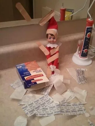 Elf On A Shelf  Playing With Bandaids