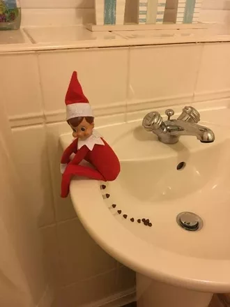 Elf On A Shelf  Leaving Some Droppings In The Sink