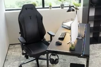 One Of The Top Gaming Chairs Portrayed Next To Desk In Front Of Window