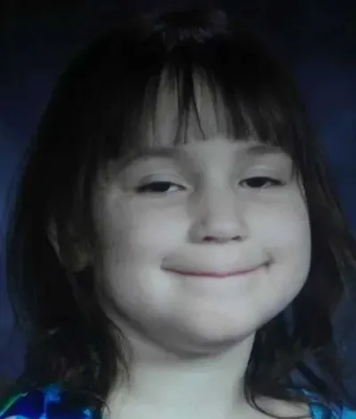 School Picture Meme Of This Kid Who Looks Like She's Plotting Her Revenge