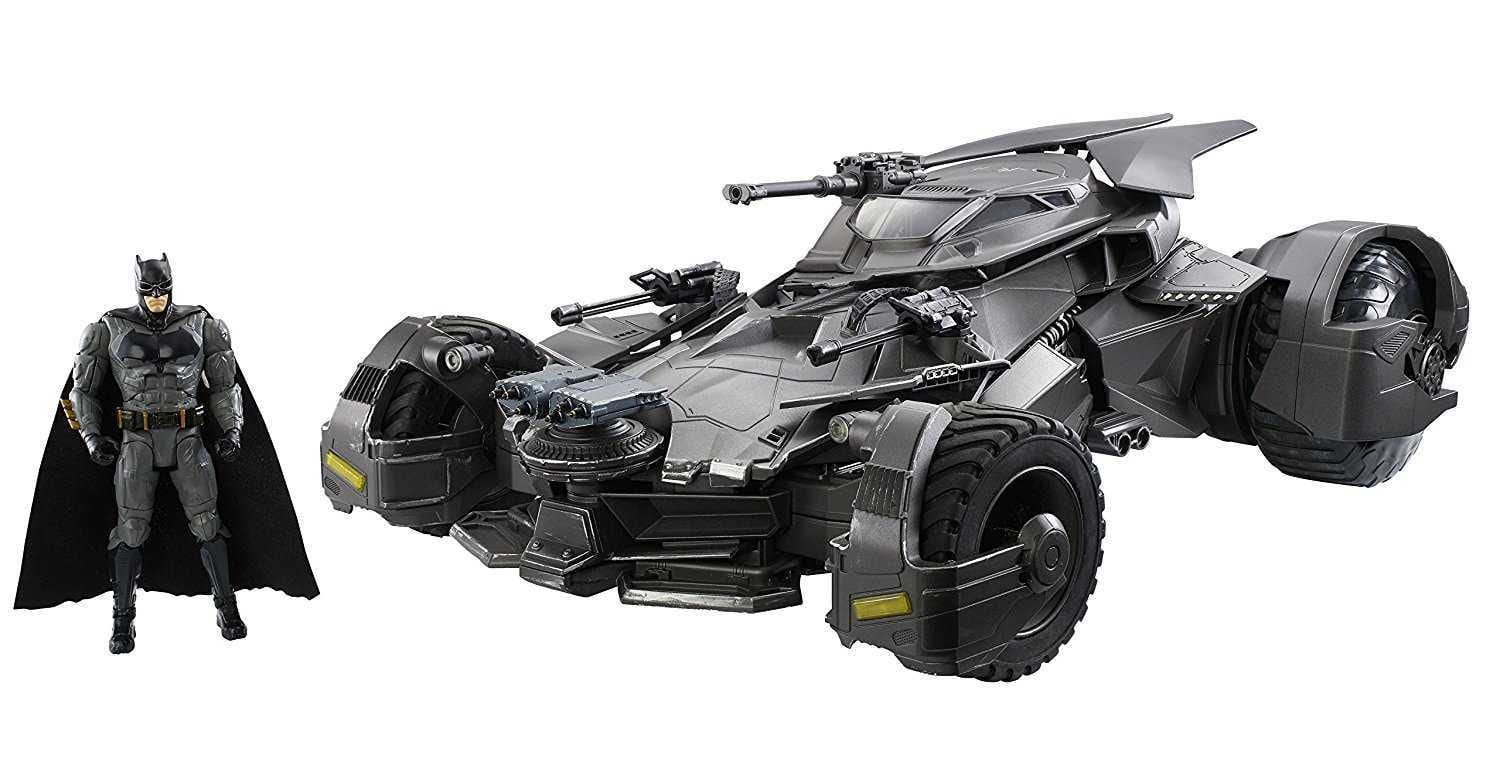 Batman Action Figure Standing Besides The Ultimate Justice League Batmobile