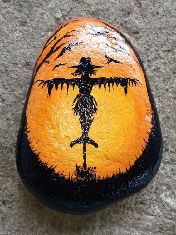 Halloween Painted Rocks Scarecrow With Orange Glow