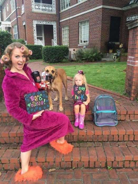First Day Of School Meme Showing A Happy Mom Holding A Sign Saying Good Bye To Her Little Girl